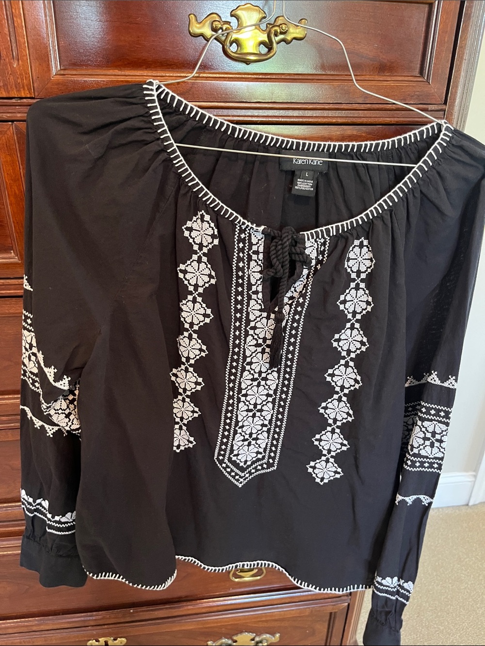 Karen Kane Black Top with White Embroidery